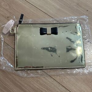 Victoria's Secret Metallic Gold Pouch with Black Accent